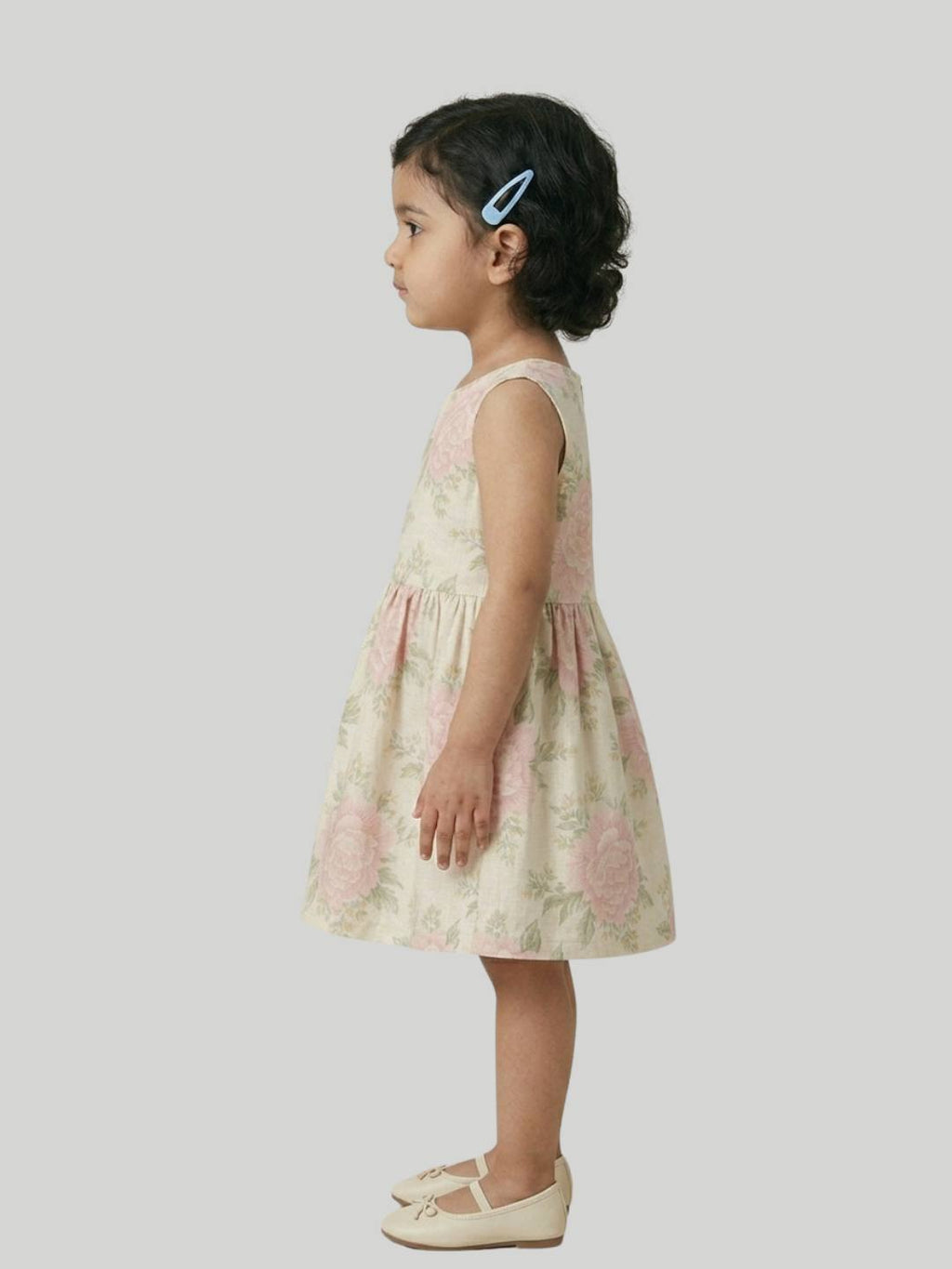 Cream floral A-line dress with soft pink flower print.
