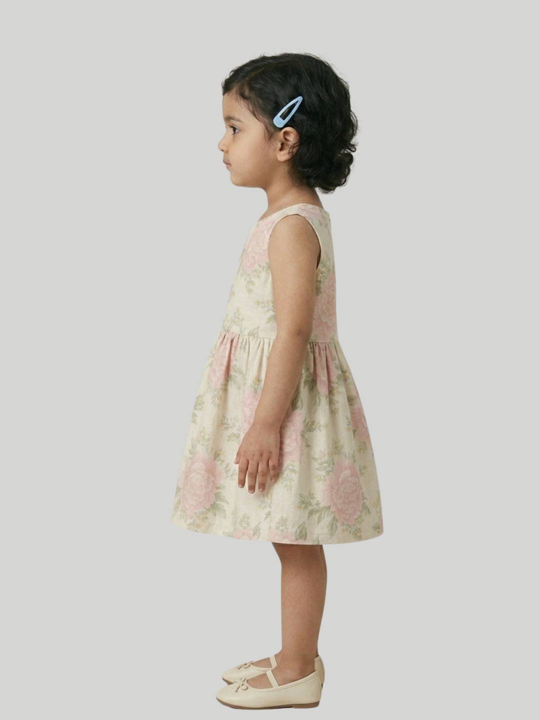 Cream floral A-line dress with soft pink flower print.