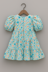Girls Tiered Floral Cotton Dress with Puffed Sleeves & Statement Bow – Summer Party Wear | Kevora Kidswear